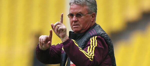 Гус Хиддинк во время матча 26-го тура чемпионата России по футболу Гус Хиддинк во время матча 26-го тура чемпионата России по футболу - Sputnik Беларусь