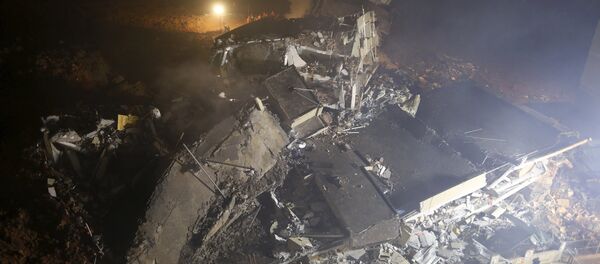 Руины здания, разрушенного в результате схода оползня в Китае - Sputnik Беларусь