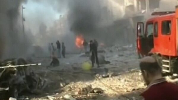 СПУТНИК_Взрыв и пожар на улицах Хомса – последствия тройного теракта в Сирии - Sputnik Беларусь