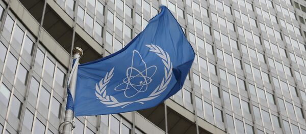 Флаг МАГАТЭ перед штаб-квартирой в Вене - Sputnik Беларусь