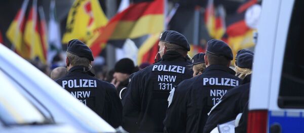 Демонстрация протеста в ответ на массовые нападения на женщин в Кельне - Sputnik Беларусь