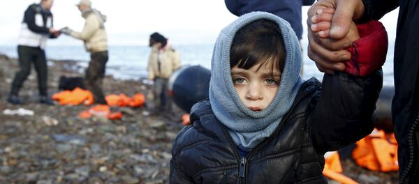 Сирийские беженцы на пляже греческого острова Лесбос Сирийские беженцы на пляже греческого острова Лесбос - Sputnik Беларусь