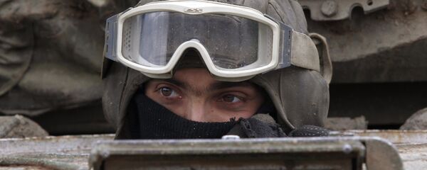 Танкист во время репетиции парада ко Дню Независимости - Sputnik Беларусь