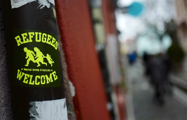 Листовка Добро пожаловать, беженцы в Фрайбурге Листовка Добро пожаловать, беженцы в Фрайбурге - Sputnik Беларусь