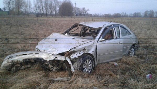Разбитая Toyota Camry, в которой ехали белорусы - Sputnik Беларусь