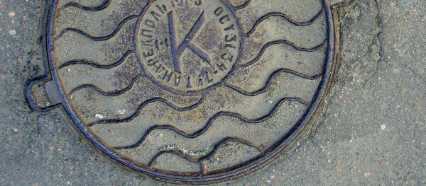 Канализационный люк. Архивное фото - Sputnik Беларусь