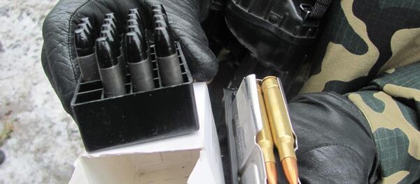 Патроны, изъятые у наруушителей - Sputnik Беларусь