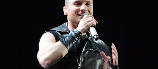 Певец Сергей Лазарев выступает на музыкальном фестивале Песня года 2014 в СК Олимпийский. - Sputnik Беларусь