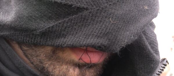 Спутник_Беженцы с зашитыми ртами протестовали против сноса лагеря мигрантов в Кале - Sputnik Беларусь