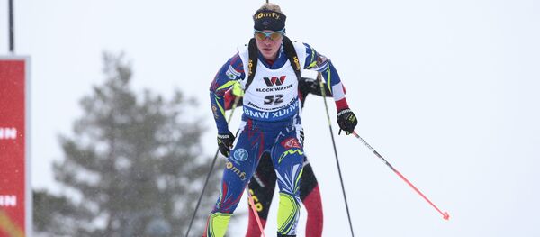 Французская биатлонистка Мари Дорен-Абер на дистанции 15 километров в норвежском Холменколлене - Sputnik Беларусь