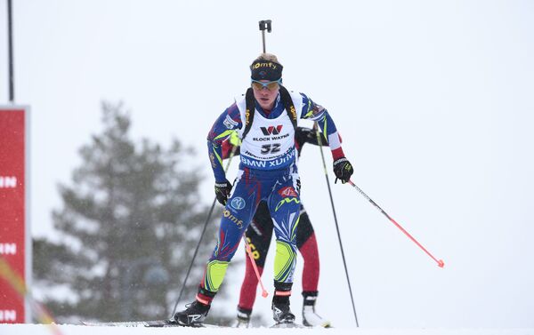 Французская биатлонистка Мари Дорен-Абер на дистанции 15 километров в норвежском Холменколлене - Sputnik Беларусь