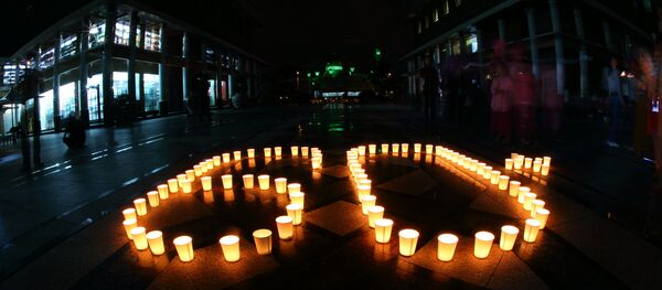 Символ Часа Земли, составленный из свечей - Sputnik Беларусь