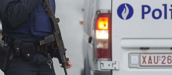 Сотрудник полиции в Брюсселе Сотрудник полиции в Брюсселе - Sputnik Беларусь