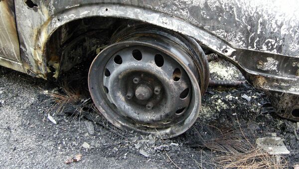 Сгоревший автомобиль. Архивное фото - Sputnik Беларусь