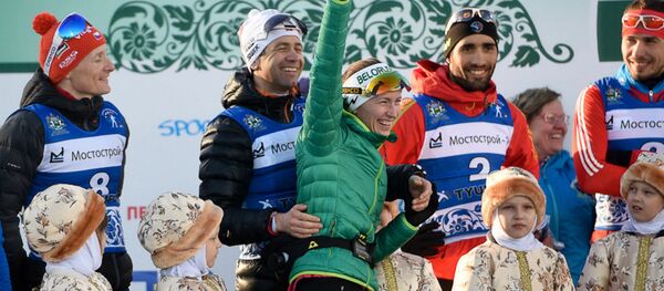 Оле-Эйнар Б'ёрндален і Дар'я Домрачава пасля Гонкі Чэмпіёнаў 2015 у Цюмені Оле-Эйнар Б'ёрндален і Дар'я Домрачава пасля Гонкі Чэмпіёнаў 2015 у Цюмені - Sputnik Беларусь