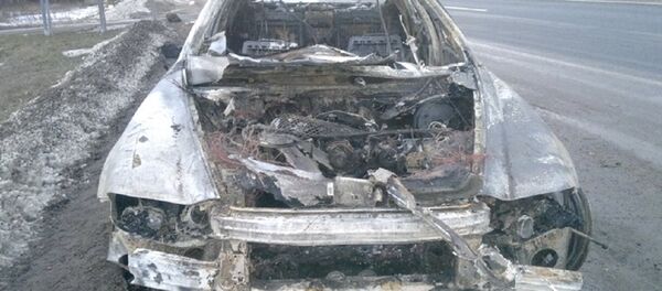 Сгоревший Maserati Quattroporte после столкновения с велосипедом Сгоревший Maserati Quattroporte после столкновения с велосипедом - Sputnik Беларусь