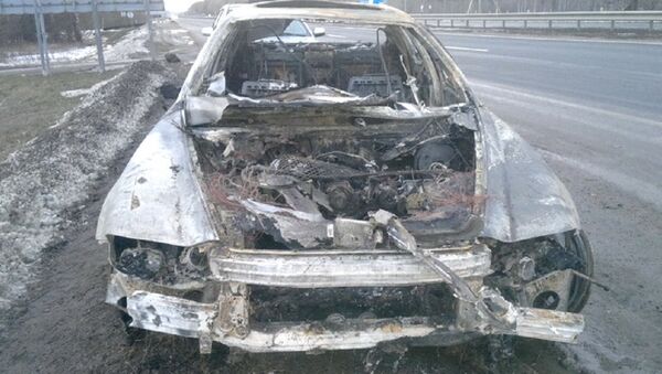 Сгоревший Maserati Quattroporte после столкновения с велосипедом - Sputnik Беларусь