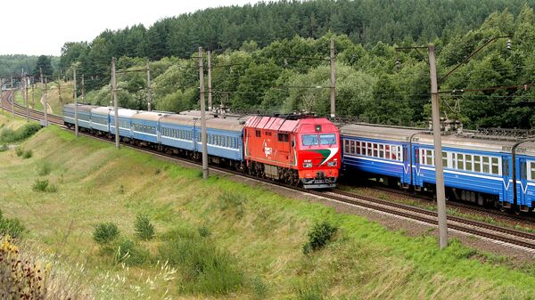 Поезд и электричка БЖД. Архивное фото - Sputnik Беларусь
