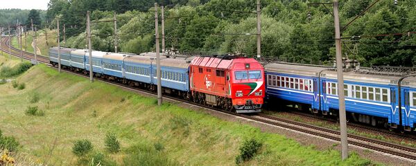 Цягнік і электрычка БЖД, архіўнае фота Цягнік і электрычка БЖД, архіўнае фота - Sputnik Беларусь