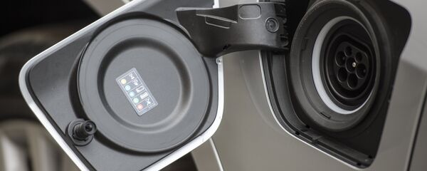 Раз'ём для зарадкі электрамабіля, архіўнае фота Раз'ём для зарадкі электрамабіля, архіўнае фота - Sputnik Беларусь