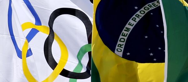 Олимпийский и бразильские флаги Олимпийский и бразильские флаги - Sputnik Беларусь