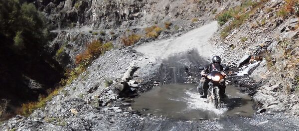 Падарожжа ў гарах на матацыкле - сур'ёзны іспыт Падарожжа ў гарах на матацыкле - сур'ёзны іспыт - Sputnik Беларусь
