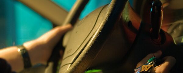 Водитель за рулем автомобиля - Sputnik Беларусь