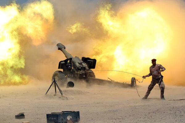 Иракские вооруженные силы ведут обстрел позиций боевиков ИГ - Sputnik Беларусь