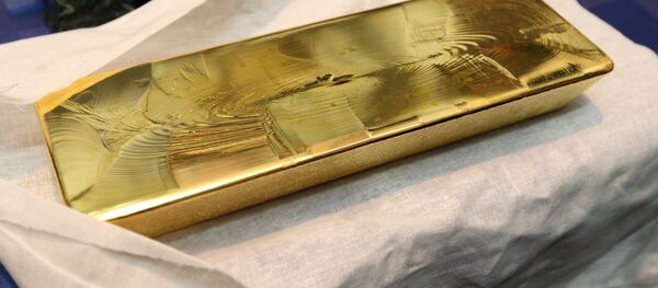 Золотой слиток Золотой слиток - Sputnik Беларусь