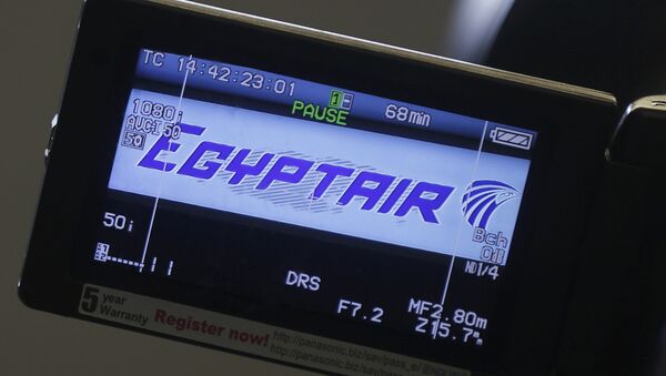 The company logo is displayed on a video camera screen at the Egyptair desk at Charles de Gaulle airport, after an Egyptair flight disappeared from radar during its flight from Paris to Cairo, in Paris, France, May 19, 2016 - Sputnik Беларусь