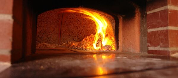 Огонь в печи. Архивное фото - Sputnik Беларусь