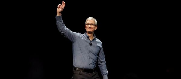Глава Apple Тим Кук на презентации операционных систем - Sputnik Беларусь