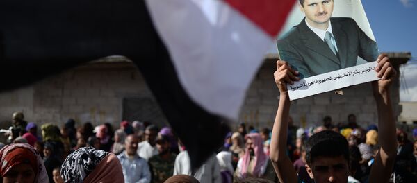 Жители населенного пункта Каукаб в Сирии Жители населенного пункта Каукаб в Сирии - Sputnik Беларусь