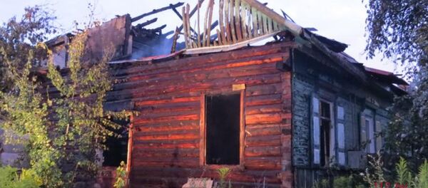 Сгоревший дом в Минске - Sputnik Беларусь