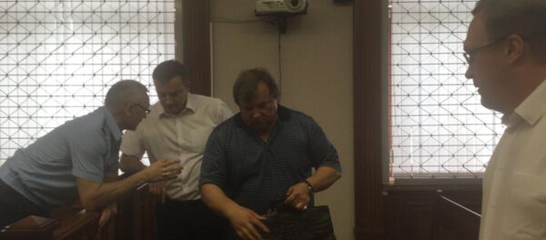 Юрий Савяк (в центре) в суде по делу Япринцевых - Sputnik Беларусь