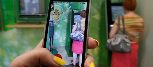 Приложение Pokemon Go на смартфоне Приложение Pokemon Go на смартфоне - Sputnik Беларусь