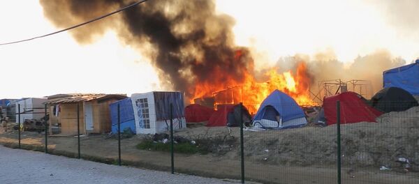 Столкнования в мигрантском лагере в Кале происходят часто - Sputnik Беларусь