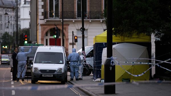 Police forensic officers work in Russell Square in London early on August 4, 2016, after a woman in her 60s was killed during a knife attack - Sputnik Беларусь