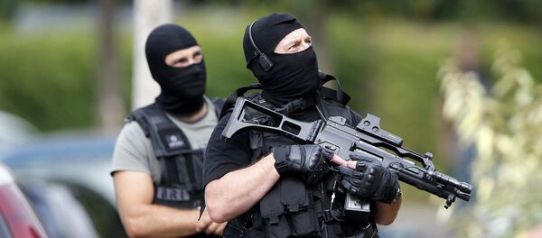 Members of French special police forces of Research and Intervention Brigade (BRI) are seen during a raid after a hostage-taking in the church in Saint-Etienne-du-Rouvray near Rouen in Normandy, France, July 26, 2016. Members of French special police forces of Research and Intervention Brigade (BRI) are seen during a raid after a hostage-taking in the church in Saint-Etienne-du-Rouvray near Rouen in Normandy, France, July 26, 2016. - Sputnik Беларусь