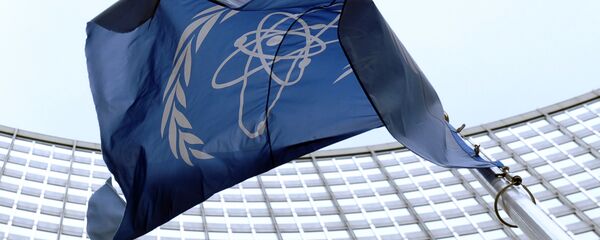 Флаг МАГАТЭ перед штаб-квартирой организации - Sputnik Беларусь