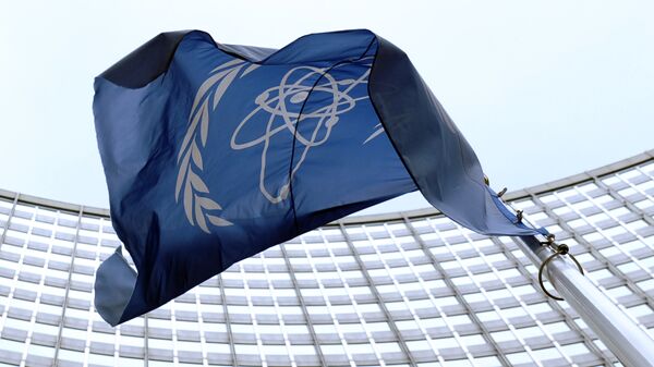 Флаг МАГАТЭ перед штаб-квартирой организации - Sputnik Беларусь