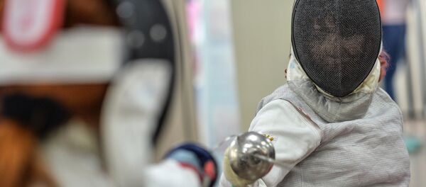 Член сборной России по фехтованию на колясках Ксения Овсянникова Член сборной России по фехтованию на колясках Ксения Овсянникова - Sputnik Беларусь