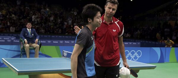 Белорусский теннисист Владимир Самсонов (справа) и японец Дзюн Мидзуки Белорусский теннисист Владимир Самсонов (справа) и японец Дзюн Мидзуки - Sputnik Беларусь