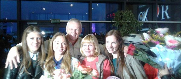 Александра Герасименя вместе со своей семьей Александра Герасименя вместе со своей семьей - Sputnik Беларусь