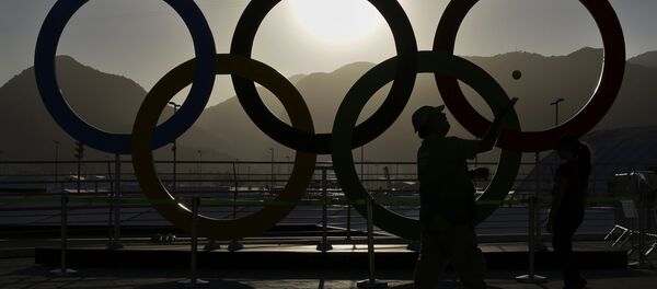Олимпийские кольца в Рио-де-Жанейро Олимпийские кольца в Рио-де-Жанейро - Sputnik Беларусь