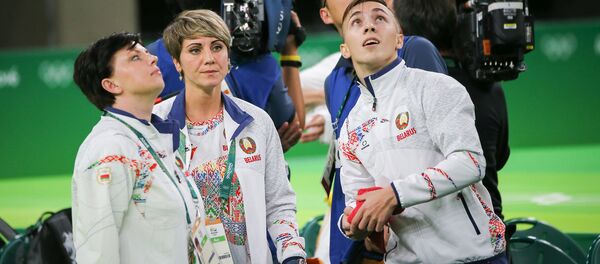 Белорусский батутист Владислав Гончаров и его тренер - Sputnik Беларусь