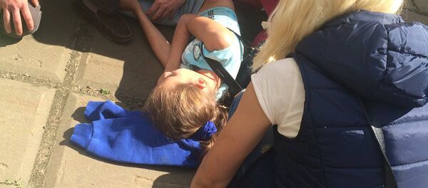 Пострадавшая на месте ДТП - Sputnik Беларусь