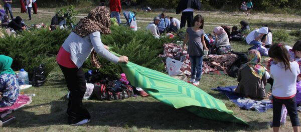 Беженцы из Чечни у белорусско-польской границы - Sputnik Беларусь