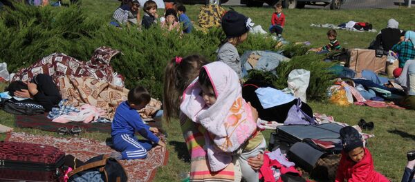 Беженцы из Чечни разбили лагерь у белорусско-польской границы - Sputnik Беларусь