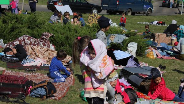 Беженцы из Чечни разбили лагерь у белорусско-польской границы - Sputnik Беларусь